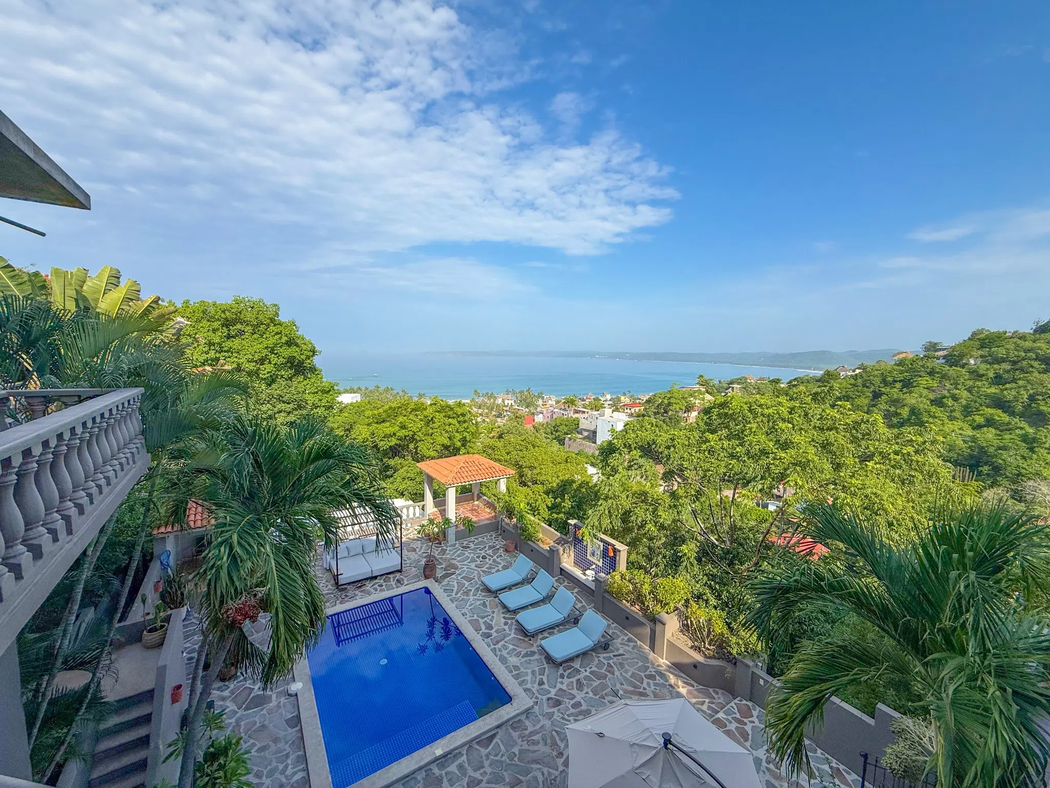 Swimming pool terrace overlooking La Manzanilla and the Pacific Ocean
